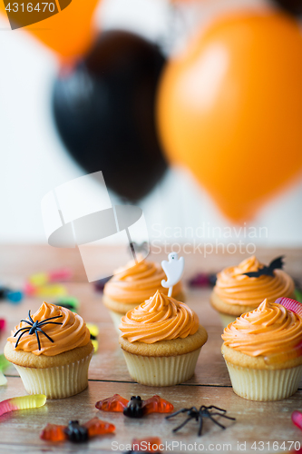 Image of halloween party cupcakes or muffins on table