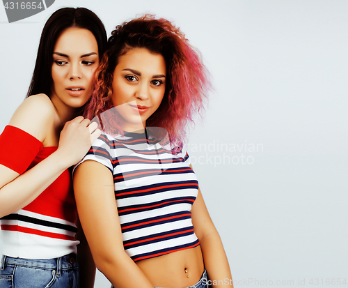 Image of best friends teenage girls together having fun, posing emotional on white background, besties happy smiling, lifestyle people concept, blond and brunette multi nations 