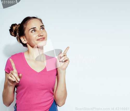 Image of young pretty teenage hipster girl posing emotional happy smiling on white background, lifestyle people concept 