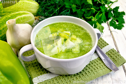 Image of Soup cucumber in white bowl on light board