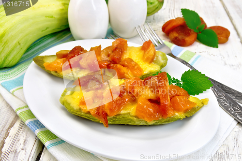 Image of Courgettes in spicy sauce on towel