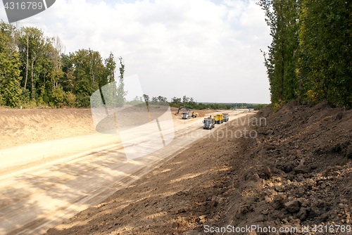 Image of repair of the road in the autumn time