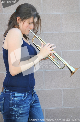 Image of Female trumpet player.