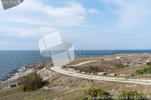 Image of Landscape witha gravel road along the coast