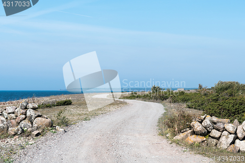 Image of Winding gravel road by the coast