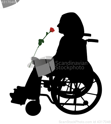 Image of Disabled person in wheelchair with red rose
