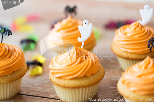 Image of halloween party cupcakes or muffins on table