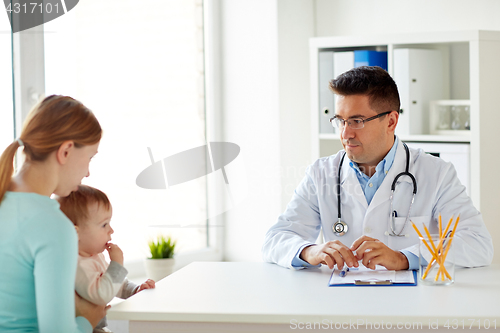 Image of woman with baby and doctor at clinic