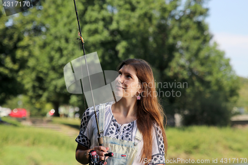 Image of summer sprouts and dungarees while fishing