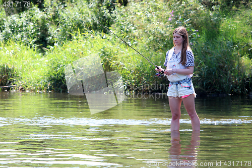 Image of Young woman with summer