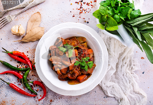 Image of fried mushrooms with vegetables