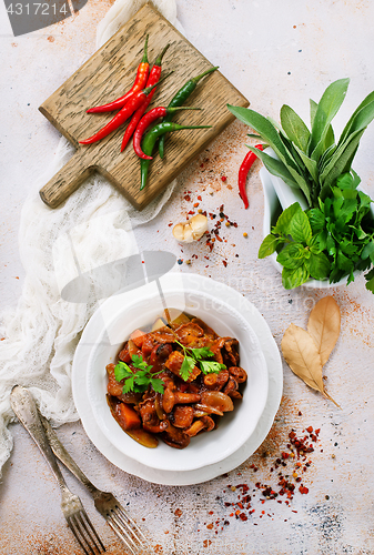 Image of fried mushrooms with vegetables