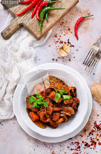 Image of fried mushrooms with vegetables