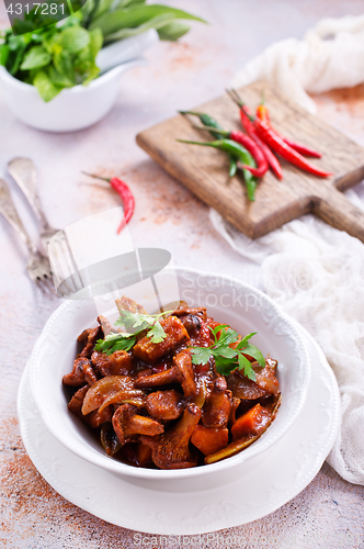 Image of fried mushrooms with vegetables