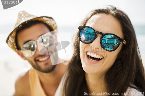 Image of Friends at the beach bar