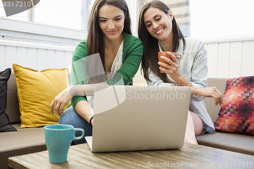 Image of Female friends at te coffee
