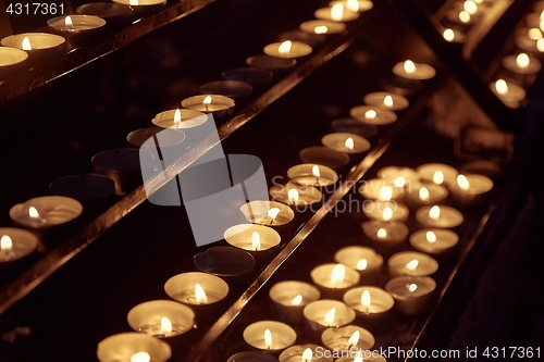 Image of Candles in a dark church