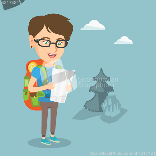Image of Young caucasian traveler woman looking at map.