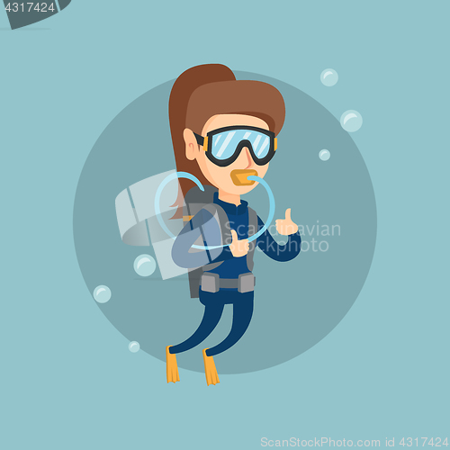 Image of Young caucasian scuba diver giving thumb up.