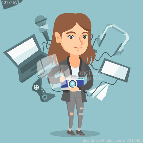 Image of Young caucasian woman surrounded by her gadgets.