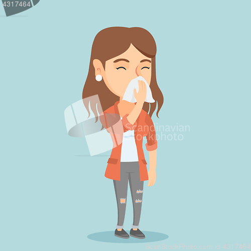 Image of Young caucasian sick woman sneezing.