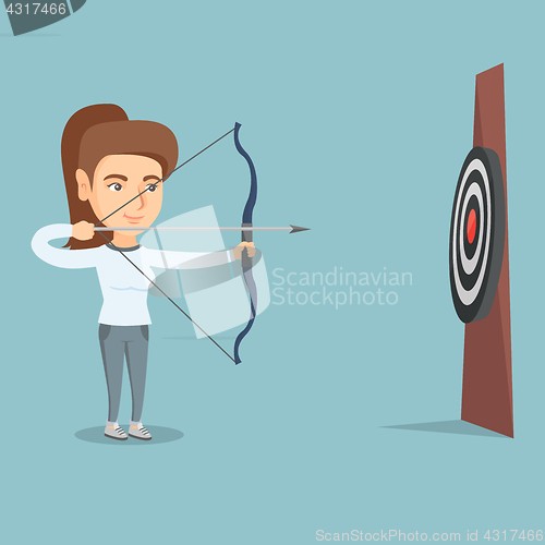 Image of Sportswoman aiming with a bow and arrow at target.