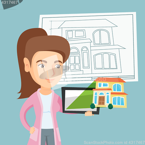 Image of Woman showing a digital tablet with house photo.