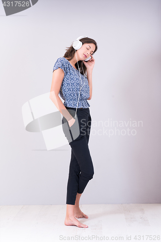 Image of woman with headphones isolated on a white