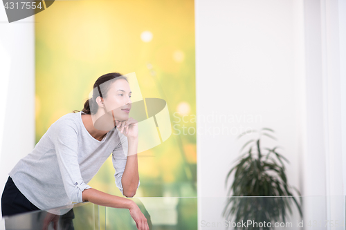 Image of portrait of a young beautiful woman at home