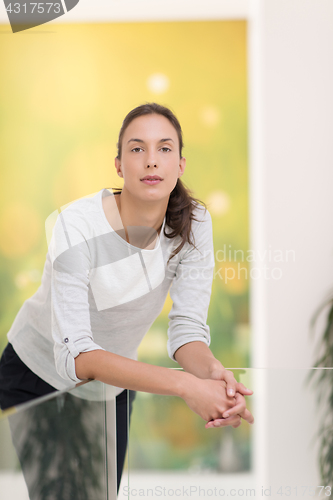 Image of portrait of a young beautiful woman at home