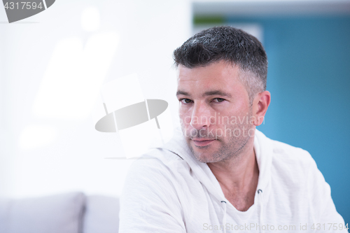 Image of Portrait of a young man at home