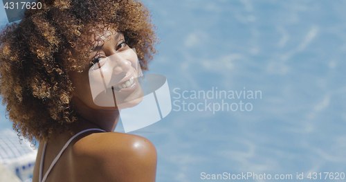 Image of Beautiful model posing in pool