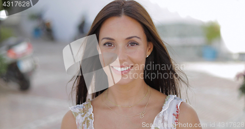 Image of Wonderful young brunette looking at camera