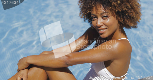 Image of Wonderful young girl in pool