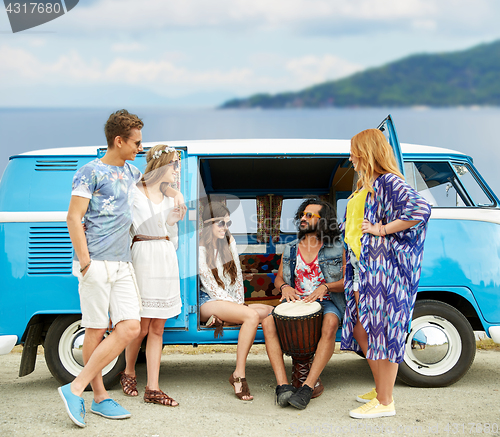 Image of hippie friends with tom-tom playing music over car