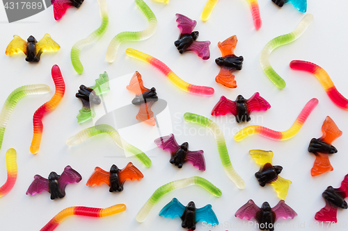 Image of gummy worms and bet candies for halloween party