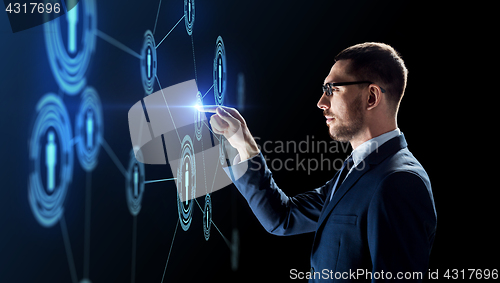 Image of businessman with virtual network contacts