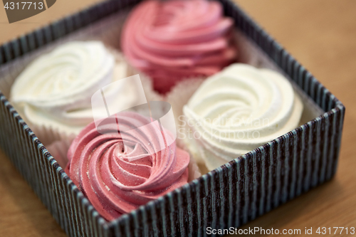 Image of close up of zephyr or marshmallows in gift box