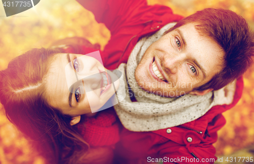 Image of close up of happy couple taking selfie at autumn