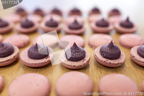 Image of macarons on table at confectionery or bakery