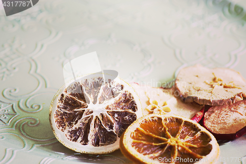 Image of Dried orange and apple slices, retro toned