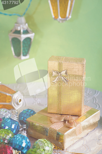 Image of Golden presents and christmas toys, retro toned