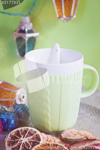 Image of Cup and cuted fruits, retro toned