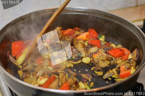 Image of Preparing hot breakfast