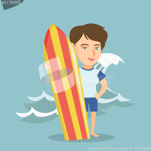 Image of Young caucasian surfer holding a surfboard.