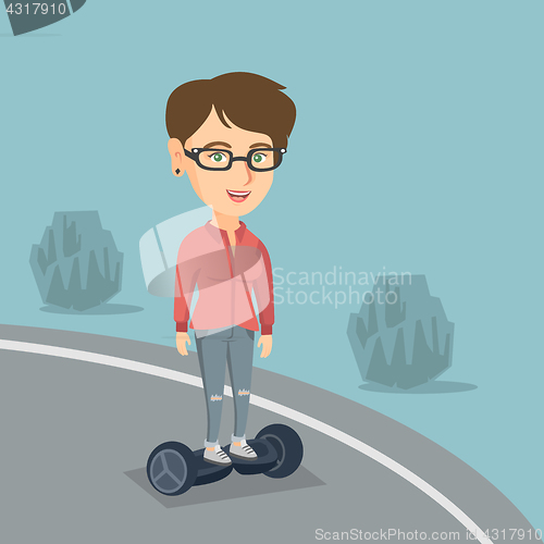 Image of Woman riding a self-balancing electric scooter.