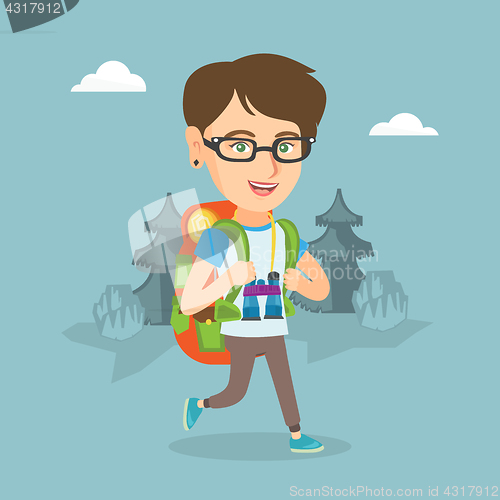 Image of Young caucasian woman with a backpack hiking.