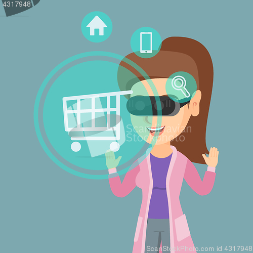 Image of Woman in virtual reality headset shopping online.