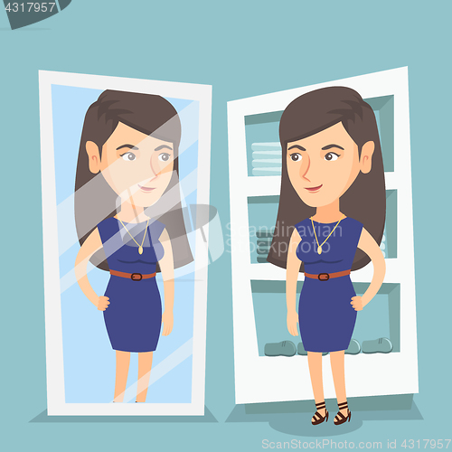 Image of Caucasian woman trying on dress in dressing room.