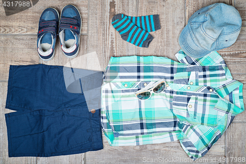 Image of Flat lay picture of boy\'s casual outfit.